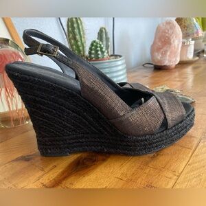 Banana Republic black raffia sole with brown metallic base.